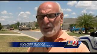 Villages sinkhole re-opens, being filled a second time