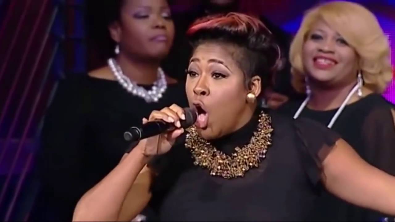 Candy West snaps during worship at Potter's House Dallas YouTube