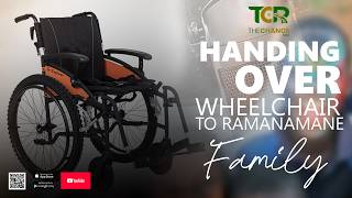 handing over wheelchair to RAMANAMANE family