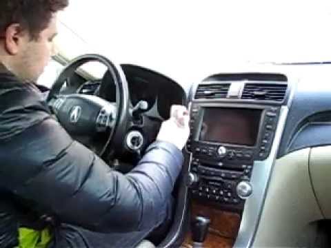 Video: Hvordan fyller jeg kjølevæske på min Acura TL?