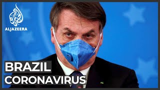 Brazil's Bolsonaro denounces mayors over virus lockdowns
