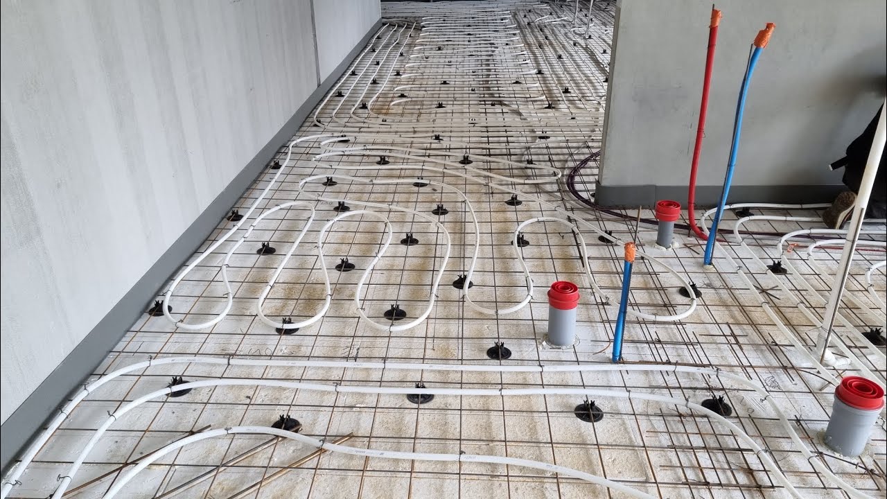 11.6.2023 Lattialämmityksen asennus kellariin ja ontelolaattojen saumavalun valmistelut