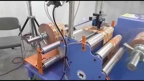 Rewinding machine with TIJ printer