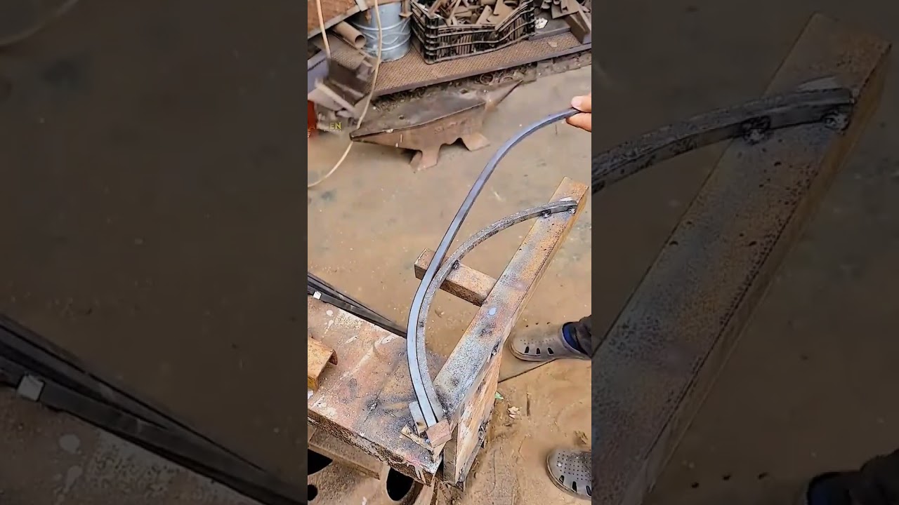 Manual bending process of metal bars into curves