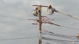 Utility pole installation relieves Mystic residents