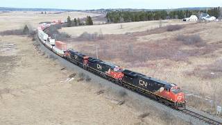 Famous Awesome Aerial 4K View! Long & Fast Stack Train CN 120 w/DPU approaching Upper Dorchester, NB Wealth