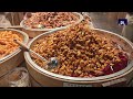 Shuitingmen: un barrio que despierta al anochecer en China