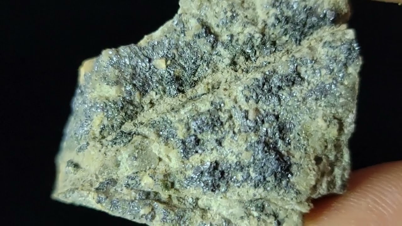 Rhenian Molybdenite - (Mo,Re)S₂