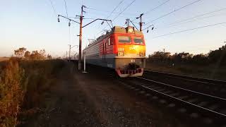 Электровоз ЭП1-241 с фирменным поездом №006Э &quot;Океан&quot; осенним утром на Транссибирской магистрали.