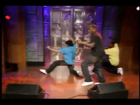 Lloyd performs wearing Christian Audigier