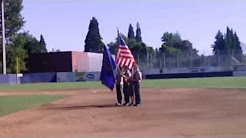 Troop 3 performing flag ceremony at American Legion Baseball game