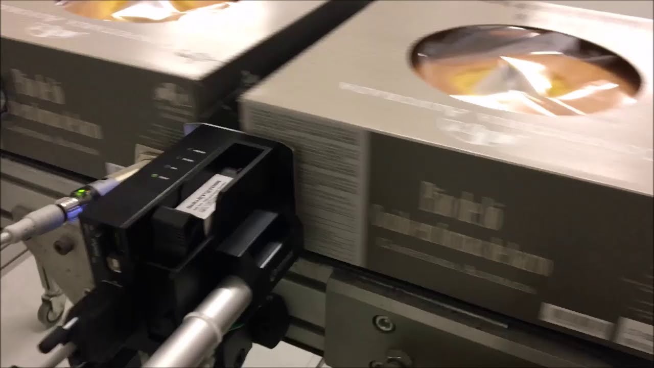 Batch and valid thru Compact Coder on card boxes