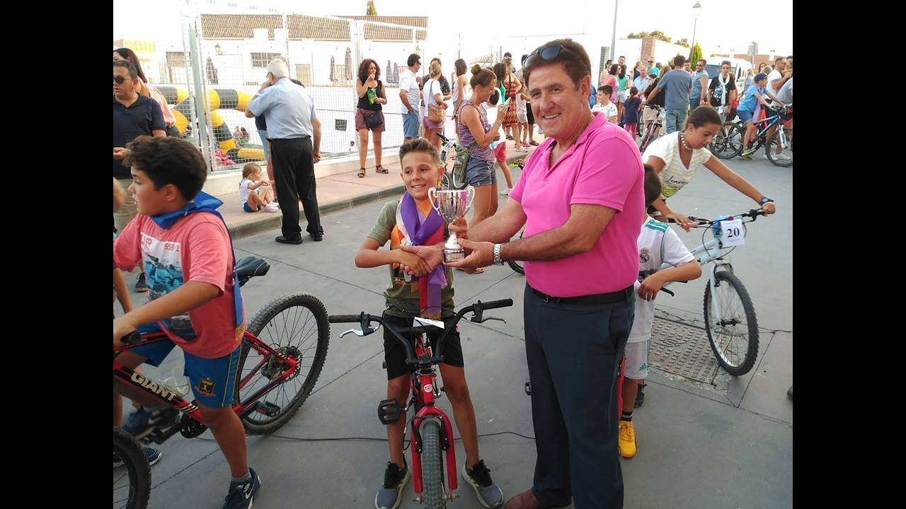 Feria Comares 2018. Carrera de cintas en bicicleta.