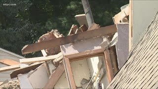 Neighbor rescues resident from collapsed home in Akron