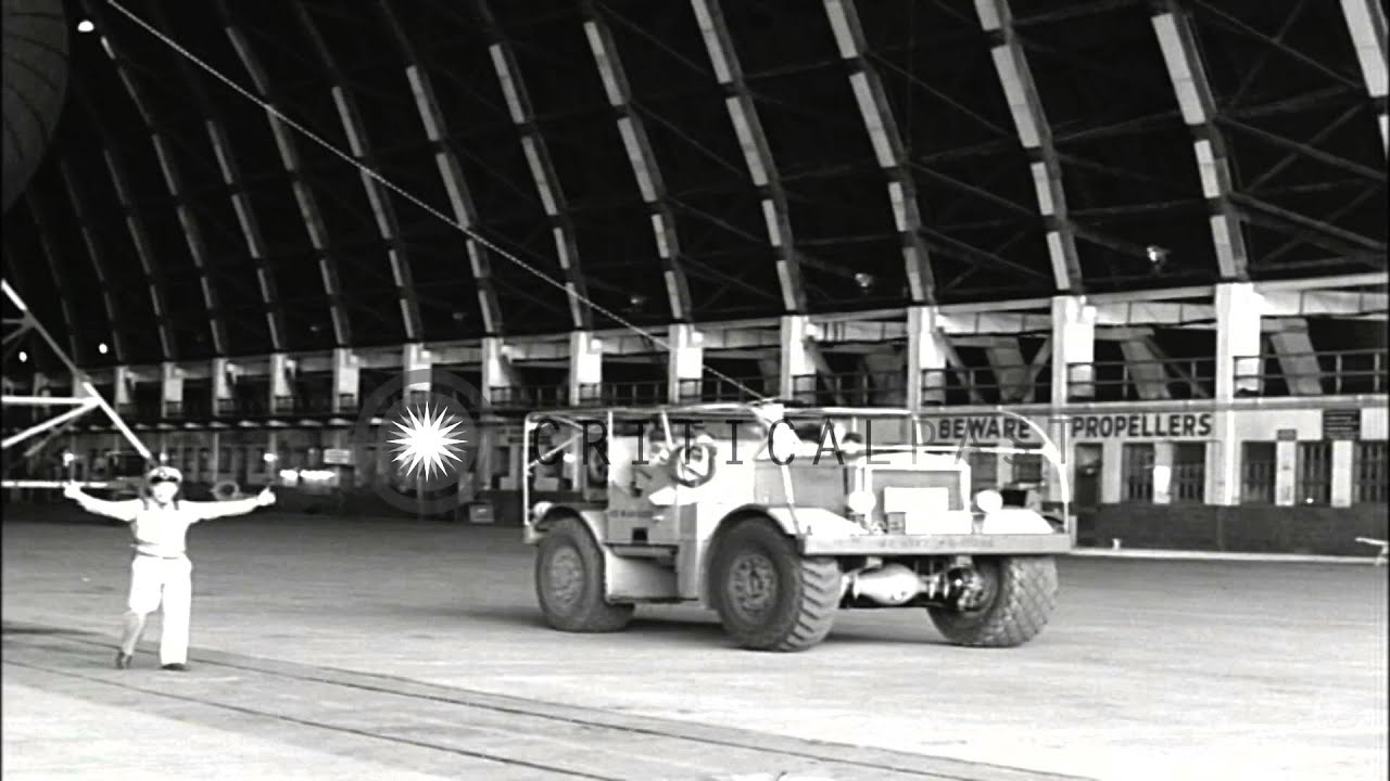 Undock operation of an airship in hangar at an airbase in United States. HD Stock Footage