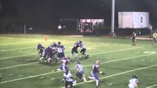 Warren Easton's Josh Johnson maneuverers pass to Tyron Johnson vs Holy Cross