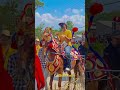 a beautiful woman danced lightly while riding a horse