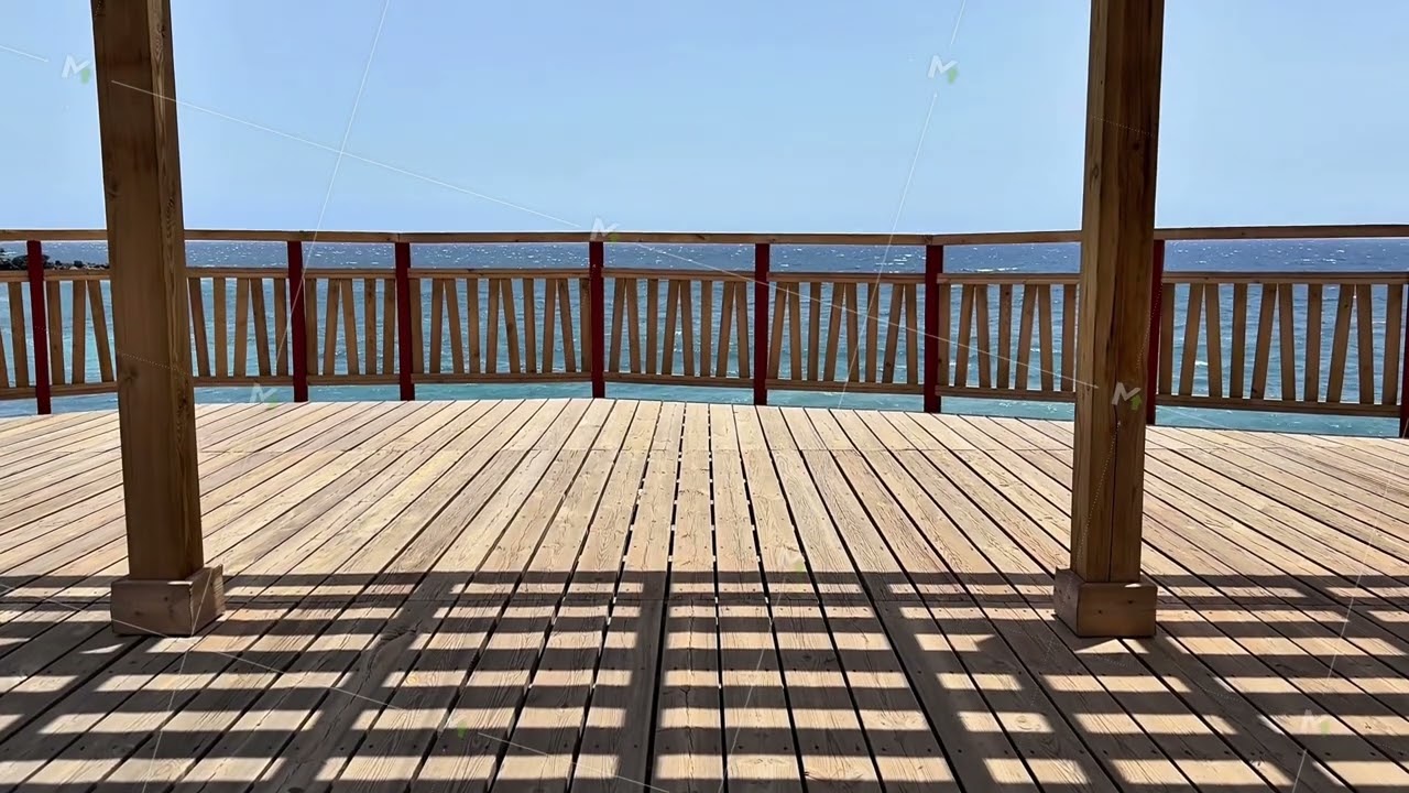Experience the Scenic Deck Which Overlooks the Ocean, Complete with Striking Shadows