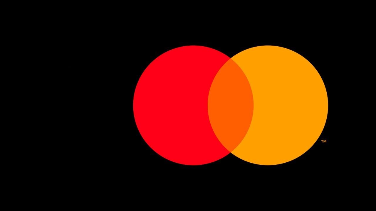 Mastercard removes the name from logo, keeps colour