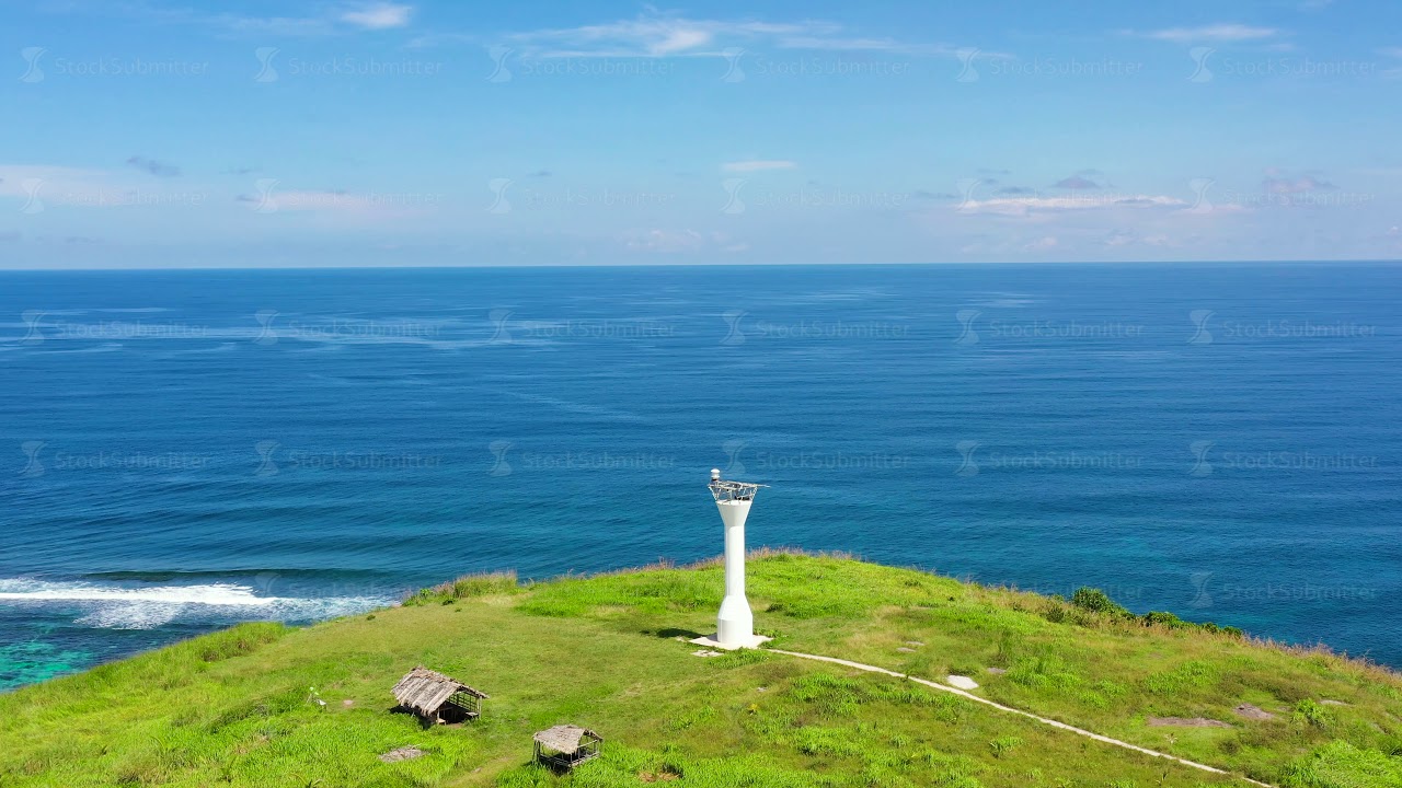 Basot Island, Caramoan, Camarines Sur, Philippines. Lighthouse on a tropical island.