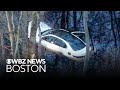 2 hurt when car plunges into water off I-93 in Massachusetts