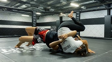 Bridge & Roll Escape from Scarfhold - BJJ Fundamentals