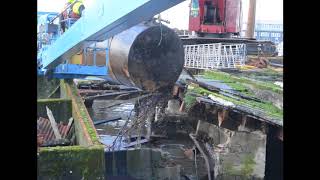 Oil tank removed from under dilapidated pier in Astoria, Oregon