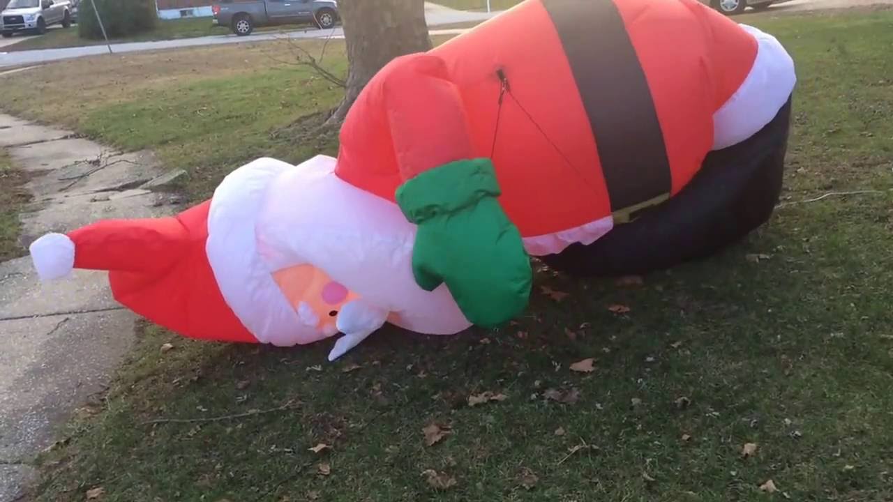 Santa Claus inflatable yard decoration coming to life. YouTube