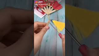 Membuat kipas kecil dari kertas origami dan stik Es krim
