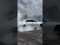 Me in the passenger of a scat pack swapped 300c burnout donuts300c srt