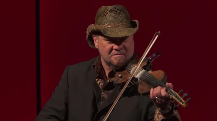 Playing a violin outside the box | Geoffrey Castle...
