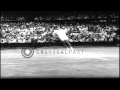 Rod Laver beats Chuck McKinley in a Men's Singles Tennis match during Wimbledon i...HD Stock Footage