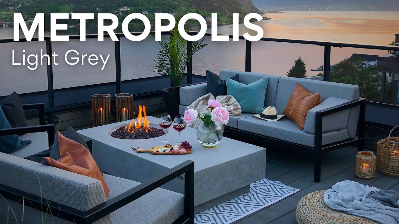METROPOLIS table with a lit fire pit