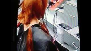 long red hair all cut off into a short bob