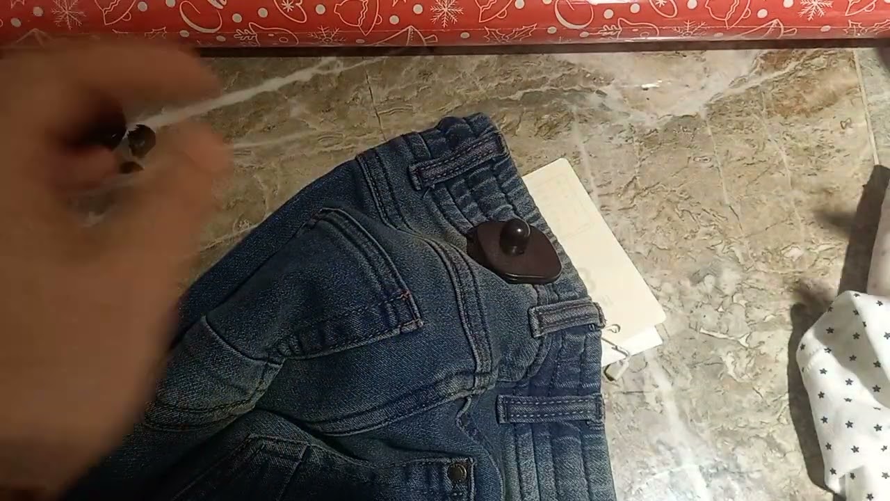 Como quitar el coso negro (broche de seguridad) de la Ropa en menos de 30 segundos