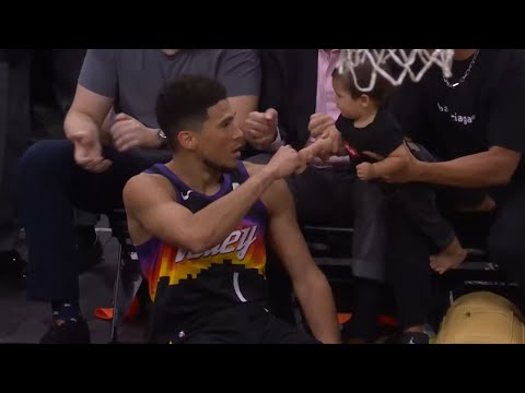 Suns SG Devin Booker fist bumps baby in epic moment after heat check bucket