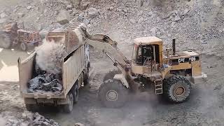 Caterpillar 966 wheel loader | Big rock loading into dump trucks