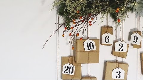How to Make a Rustic Wall Hanging DIY Advent Calendar with Kraft Paper, Faux Foliage & Chalk Paint