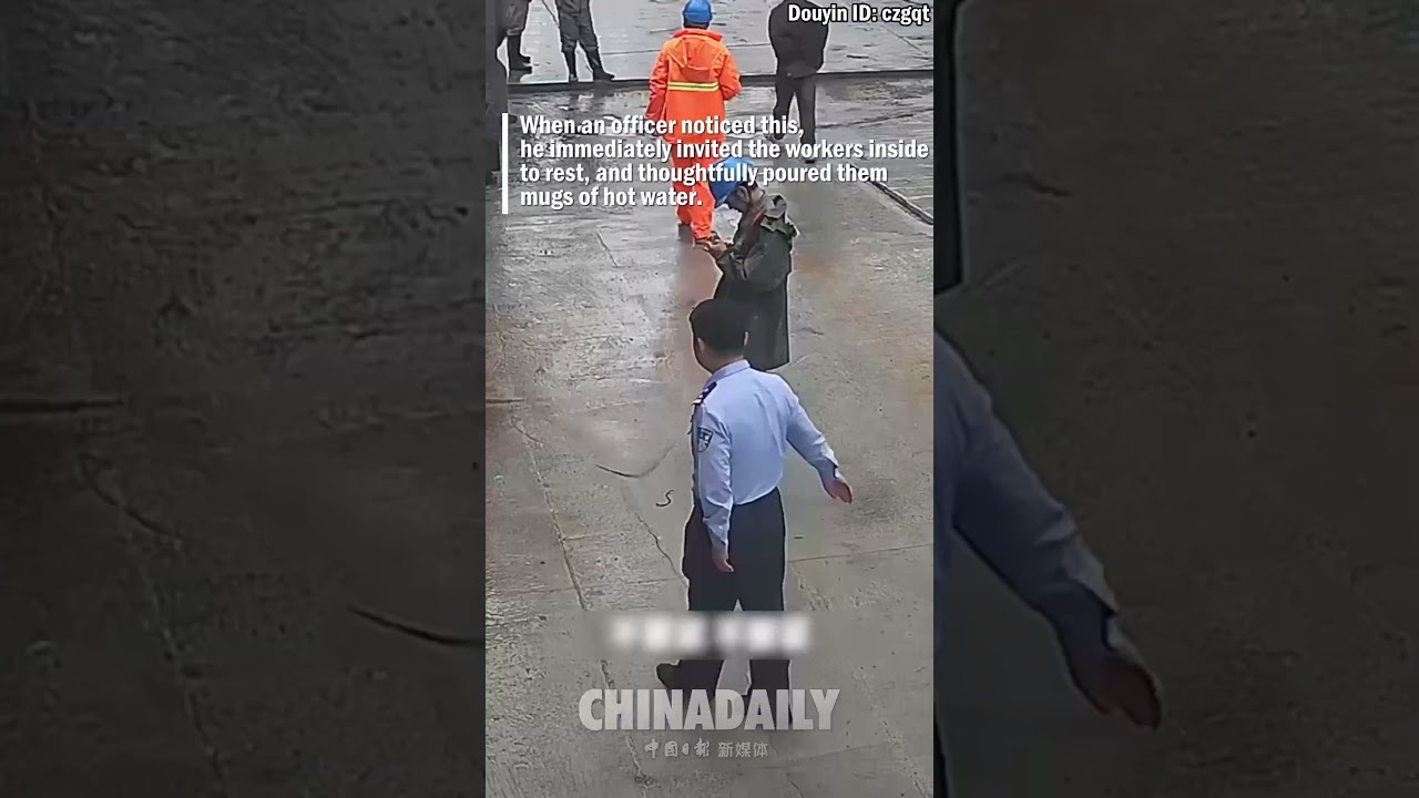 Police shelter road workers from rain