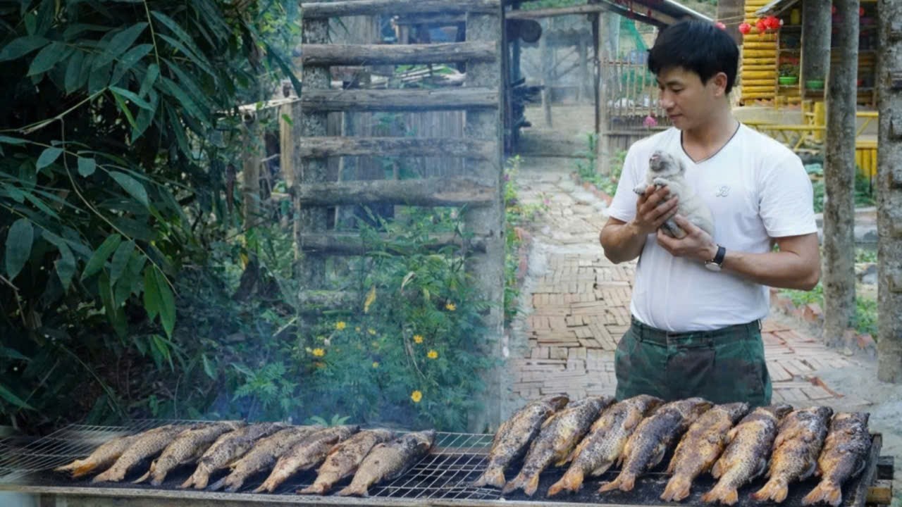 The CEO and his little dog, Lucky, harvest, process, and preserve fish according to a family recipe.
