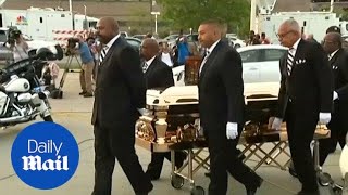 Aretha Franklin's body arrives in GOLD casket as mourners gather