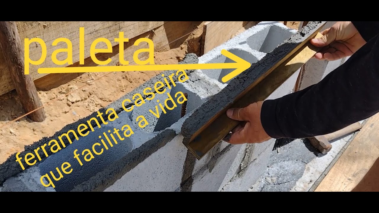 como assentar bloco de concreto com paleta