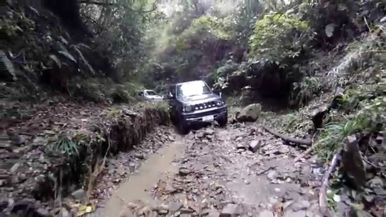 SUZUKI Jimny going up the mountain stream of Daifukuyama in Chiba, Japan