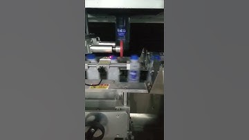 Adjusting video of juice plastic bottle sleeve shrinking labeling machine testing video