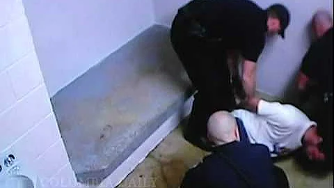 Officer loses job over holding cell incident