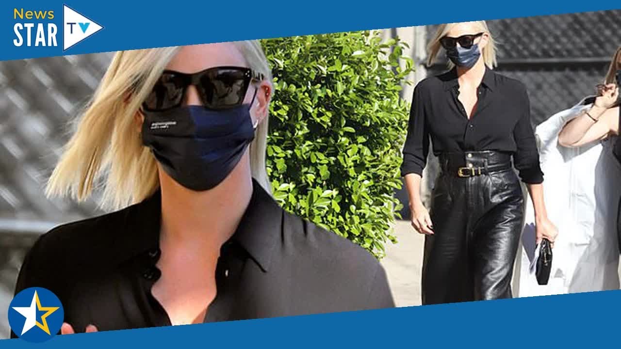 Charlize Theron oozes gothic glamour as she heads to promote The Addams Family 2 in chic Celine look