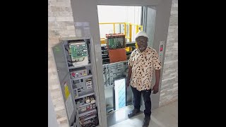 Machine roomless, gearless, steel belt traction elevator, driven by a variable frequency motor