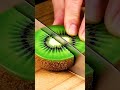 🥝 Vibrant Kiwi Slicing: Precision Cuts &amp; Juicy Emerald Textures!