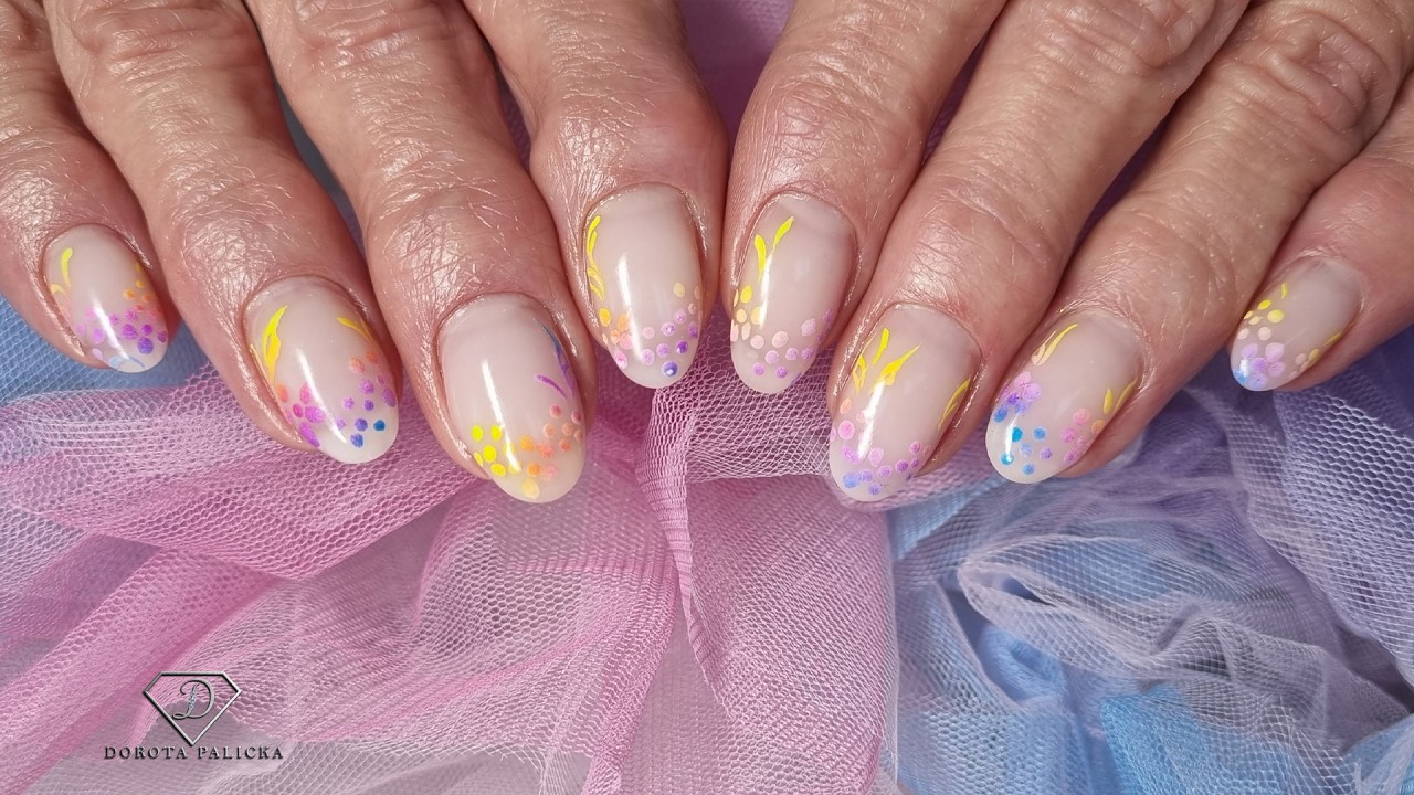 Fixing a broken nail during gel rebalance to match natural nails. Rainbow ombre spring flowers nails
