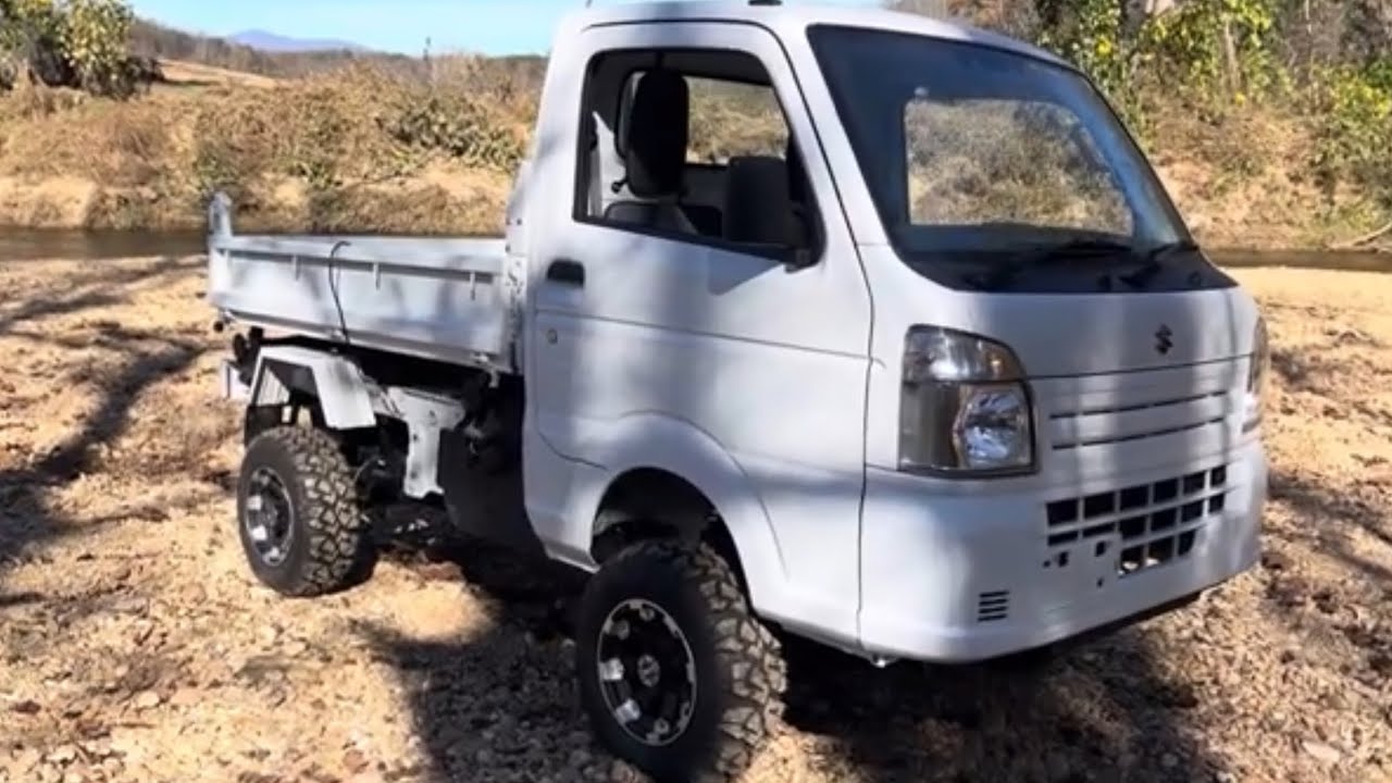 New Scissor lift/dump Suzuki